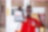 Ghanaian Customer Champion holding Shell Helix carton