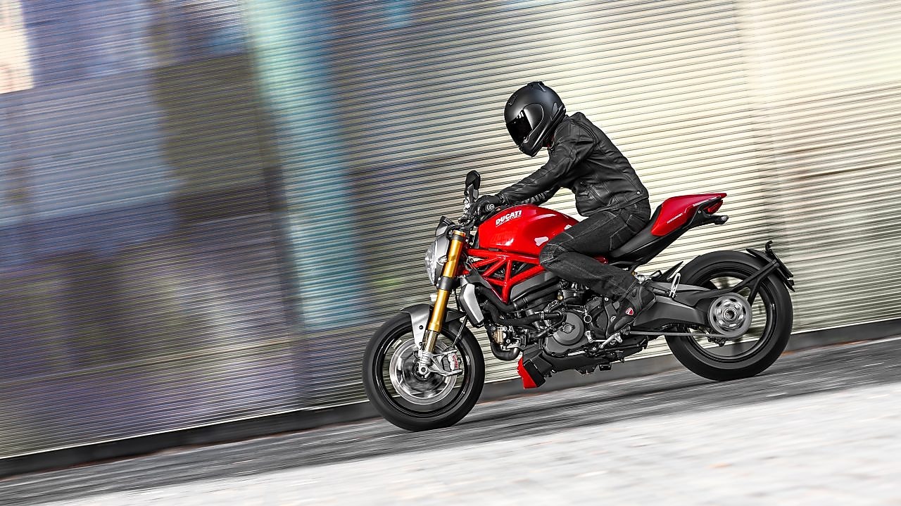 Man riding a bike which is using the Superior Engine Oil For Bikes