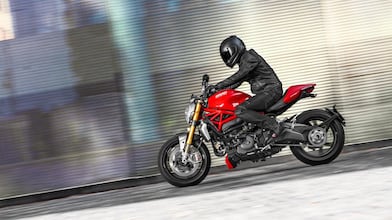 Man riding a bike which is using the Superior Engine Oil For Bikes