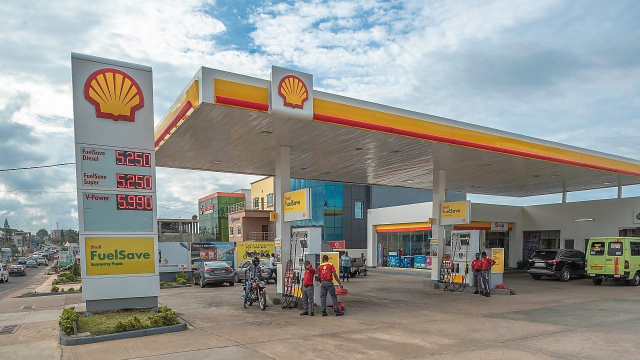 The forecourt of a shell service station at dusk