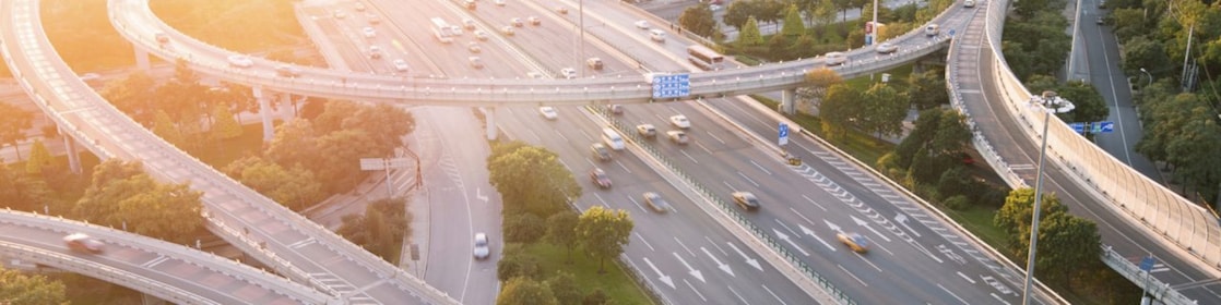 Cars driving on a complicated highway infrastructure with over and under passes