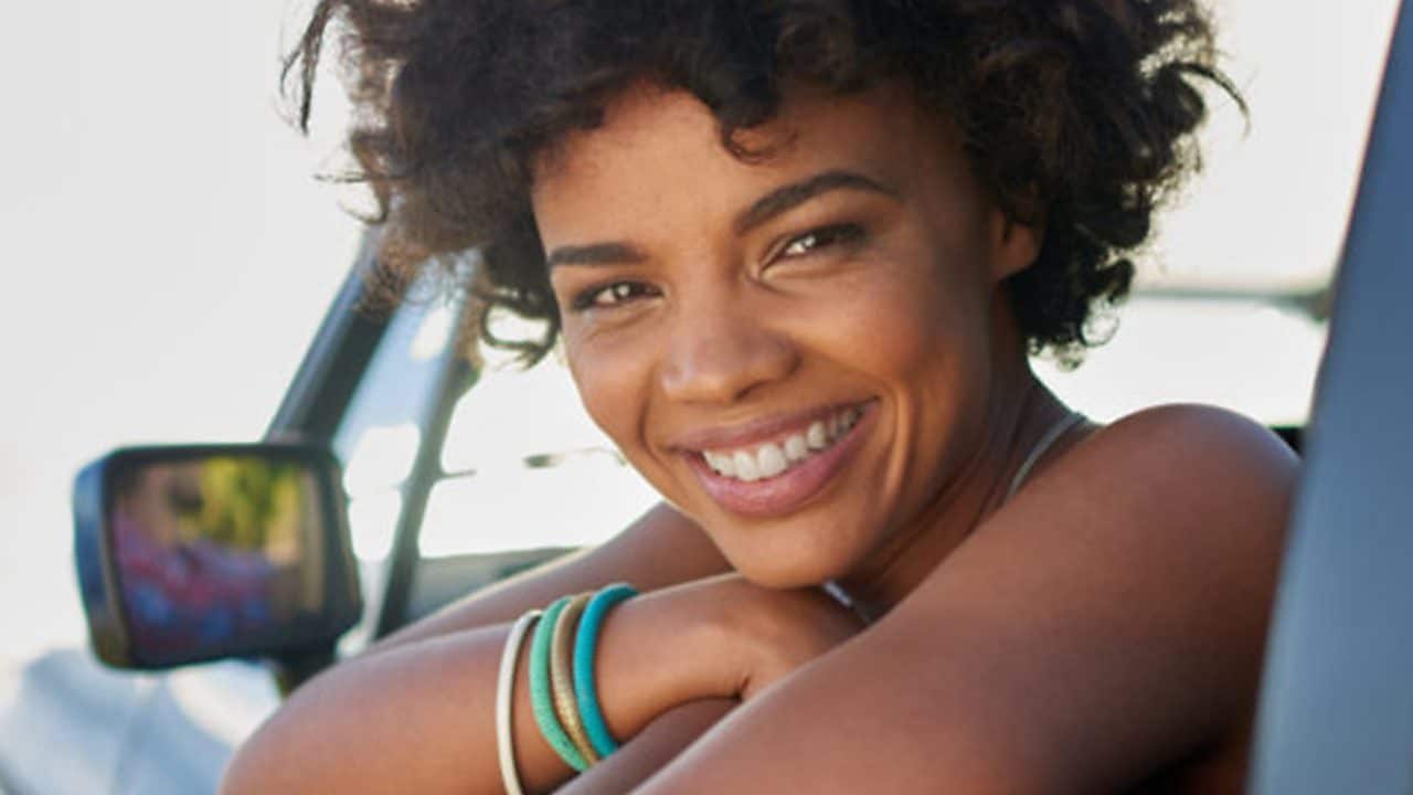 Malaysian assistant greeting guest