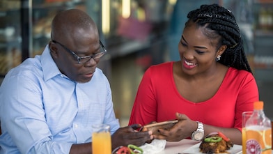 man and woman having lunch